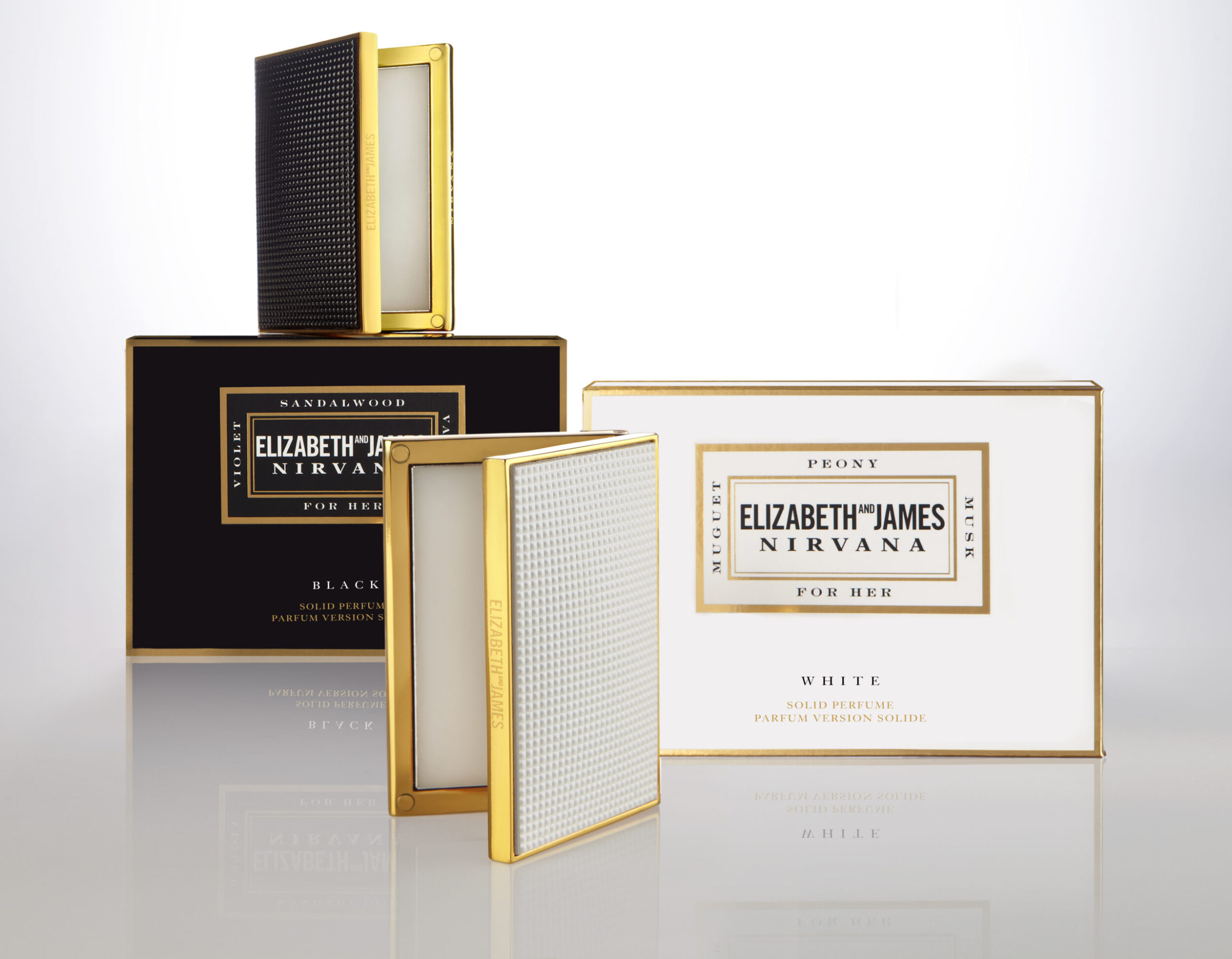 Elizabeth and James stacked solid perfume with compacts